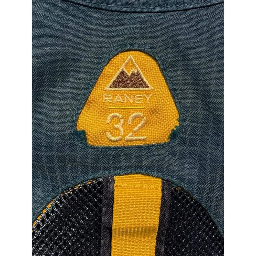 JanSport Raney 32 Hiking Travel Backpack blue/yellow